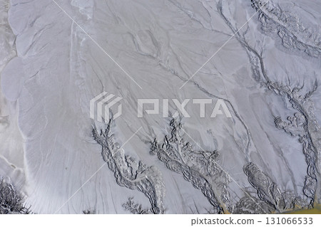 Abstract mud cracks and patterns aerial view 131066533