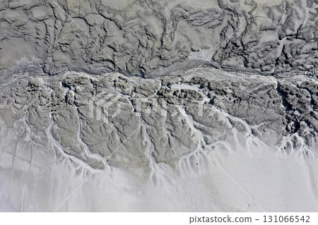 Abstract mud cracks and patterns aerial view 131066542