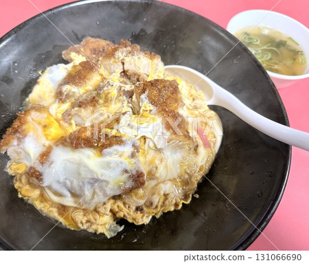 Hot pork cutlet bowl from a local Chinese restaurant 131066690