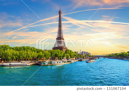 Paris skyline with Eiffel Tower and River Seine at sunset, France 131067104