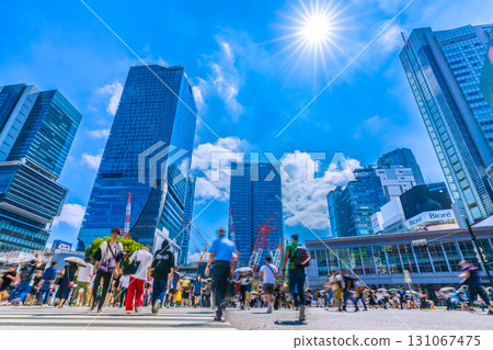 Tokyo cityscape, Japan, September 17th. Shibuya Scramble Crossing crowded with foreign tourists, a ray of hope for a new era Tokyo cityscape, Japan, September 17th. Shibuya Scramble Crossing crowded with foreign tourists, a ray of hope for a new era 131067475