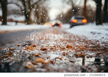 a car on the background of a winter snow-covered road with ice, the concept of traffic safety on a slippery road 131069053