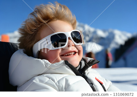 portrait of a boy enjoying snow and winter portrait of a boy enjoying snow and winter 131069072