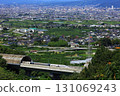 The Linear Shinkansen emerging from the tunnel and the view of the Kofu Basin 131069243