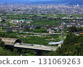 The Linear Shinkansen emerging from the tunnel and the view of the Kofu Basin 131069263
