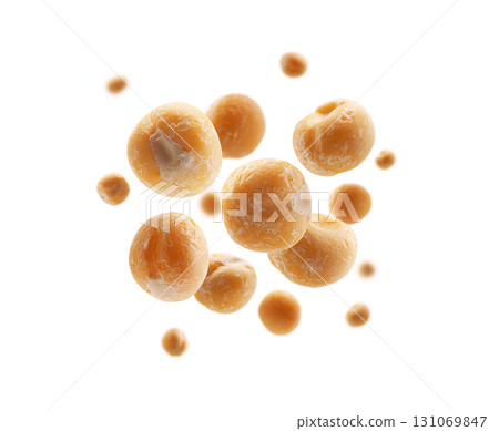 Dry yellow peas levitate on a white background Dry yellow peas levitate on a white background 131069847