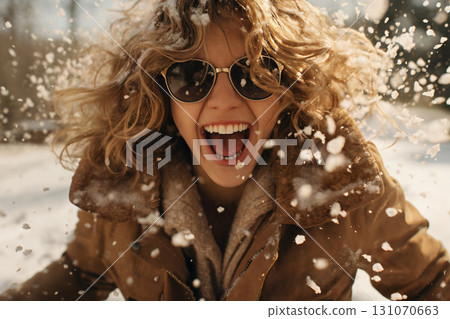 portrait of a beautiful happy woman enjoying winter season portrait of a beautiful happy woman enjoying winter season 131070663