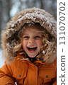 portrait of a child girl enjoying snow and winter 131070702