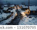 village street in winter season, old weathered homes and dirt on the road, rundown environment, snow, sunset, street lights 131070705