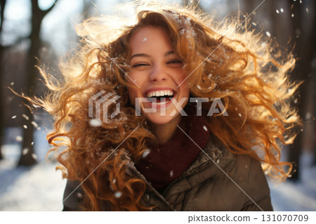 portrait of a beautiful happy woman enjoying winter season 131070709