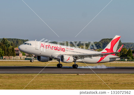 Belgium, Brussels Airport, Air Arabia aircraft landing. Airbus A320. Belgium, Brussels Airport, Air Arabia aircraft landing. Airbus A320. 131072562