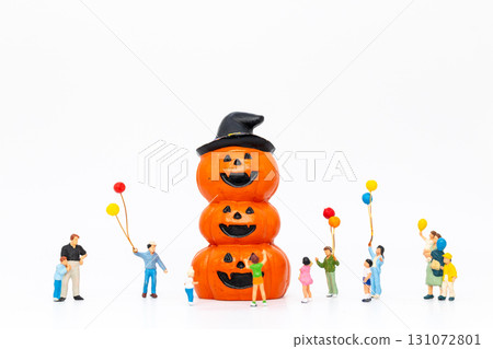 Miniature People Celebrate Halloween with Pumpkin Tower Miniature People Celebrate Halloween with Pumpkin Tower 131072801