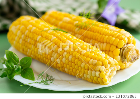Hot corn cobs with greens fresh homemade side dish 131072865