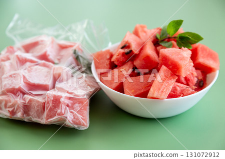 Organic watermelon pieces frozen in package for long preservation 131072912