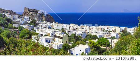 beautiful Greek islands - Nisyros (Dodecanese) panorama of Mandraki village with monastery beautiful Greek islands - Nisyros (Dodecanese) panorama of Mandraki village with monastery 131072995
