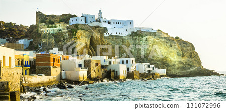 beautiful Greek islands - Nisyros (Dodecanese) sunset over Mandraki village with monastery 131072996