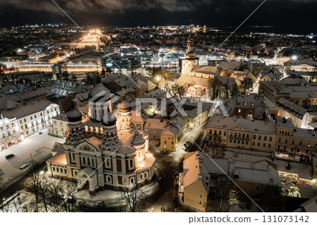 Aerial night View of Tallinn in winter with Alexander Nevsky Cathedral, roofs with snow, Christmas mood Aerial night View of Tallinn in winter with Alexander Nevsky Cathedral, roofs with snow, Christmas mood 131073142