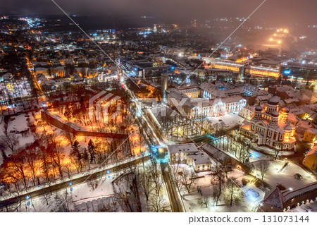 Aerial night View of Tallinn in winter with Alexander Nevsky Cathedral, roofs with snow, Christmas mood Aerial night View of Tallinn in winter with Alexander Nevsky Cathedral, roofs with snow, Christmas mood 131073144