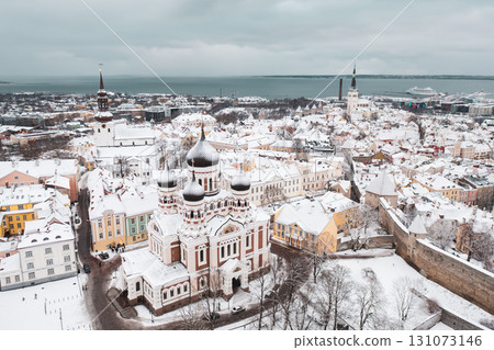 Aerial View of Tallinn in winter with Alexander Nevsky Cathedral, roofs with snow, Christmas mood Aerial View of Tallinn in winter with Alexander Nevsky Cathedral, roofs with snow, Christmas mood 131073146