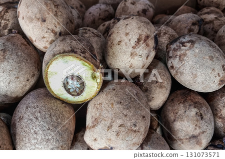 Fresh bambangan or embang fruit from the jungle for sale in fresh market in Sibu, Sarawak Fresh bambangan or embang fruit from the jungle for sale in fresh market in Sibu, Sarawak 131073571