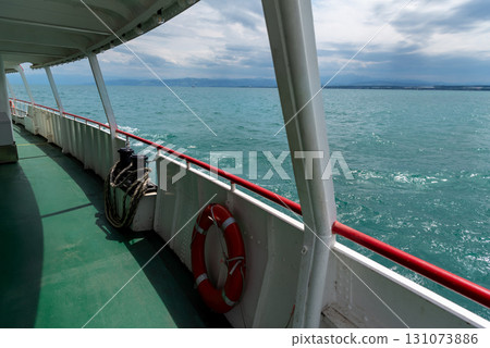 Boat trip on Lake Constance in Germany, on a sunny day in summer Boat trip on Lake Constance in Germany, on a sunny day in summer 131073886