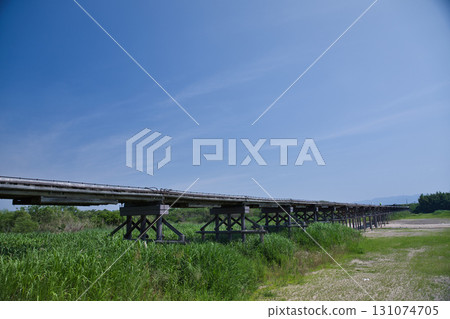 Kyoto: Flowing bridge seen from the wide riverbank of the Kizu River 3 131074705