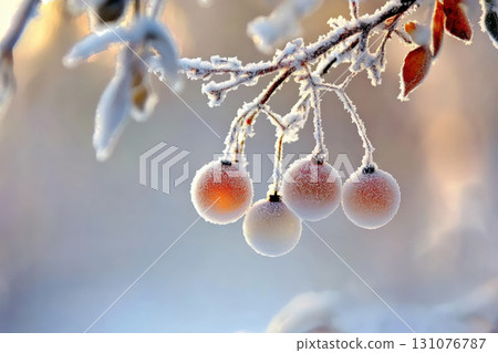 Frosted winter ornaments hang delicately from branches, creating serene and magical atmosphere. soft colors and icy details evoke sense of tranquility and beauty 131076787