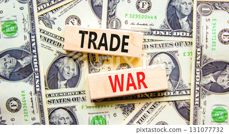 Trade war symbol. Concept word Trade war on beautiful wooden blocks. Dollar bills. Beautiful dollar bills background. Business trade war concept. Copy space. 131077732