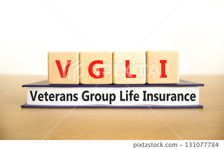 VGLI Veterans Group Life Insurance symbol. Concept word VGLI Veterans Group Life Insurance on blocks. Beautiful white background. Business VGLI Veterans Group Life Insurance concept. Copy space. VGLI Veterans Group Life Insurance symbol. Concept word VGLI Veterans Group Life Insurance on blocks. Beautiful white background. Business VGLI Veterans Group Life Insurance concept. Copy space. 131077784
