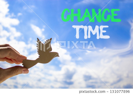 Chance time symbol. Concept word Chance time on beautiful blue sky. Businessman's hand with wooden bird. Beautiful blue sky and cloud background. Business chance time concept. Copy space. Chance time symbol. Concept word Chance time on beautiful blue sky. Businessman's hand with wooden bird. Beautiful blue sky and cloud background. Business chance time concept. Copy space. 131077896