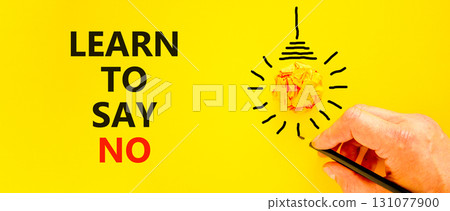 Learn to say no symbol. Concept words phrase Learn to say no on beautiful yellow paper. Businessman's hand. Beautiful yellow background. Business psychological Learn to say no concept. Copy space. Learn to say no symbol. Concept words phrase Learn to say no on beautiful yellow paper. Businessman's hand. Beautiful yellow background. Business psychological Learn to say no concept. Copy space. 131077900