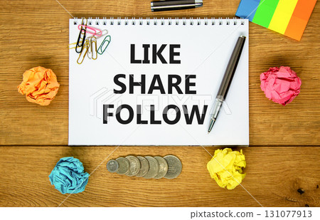Like share follow symbol. Concept words Like Share Follow on beautiful white note. Beautiful wooden background. Black pen. Colored paper. Business like share follow concept. Copy space. 131077913