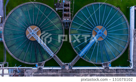 Aerial view circular clarifier tank at wastewater treatment plant, Industrial infrastructure, Environment technology sustainable water management system, Sedimentation tank circular clarifier. 131078102