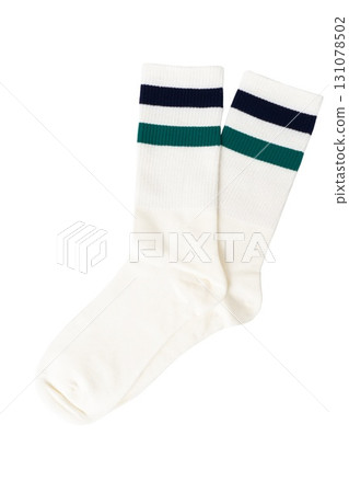 White crew socks with blue and green stripes on black background White crew socks with blue and green stripes on black background 131078502