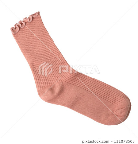 Pink ruffled sock on black background Pink ruffled sock on black background 131078503