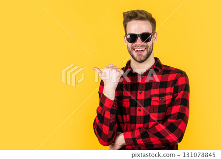 stylish guy with trendy hairstyle wear checkered shirt and glasses, accessory stylish guy with trendy hairstyle wear checkered shirt and glasses, accessory 131078845