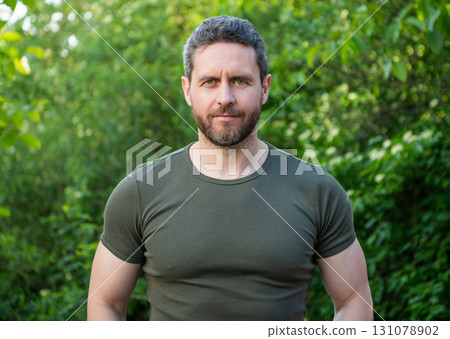 unshaven guy in shirt. caucasian guy with beard. mature guy outdoor unshaven guy in shirt. caucasian guy with beard. mature guy outdoor 131078902
