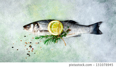 fresh, raw, sea bass fish, with spices and citrus fruits, one piece, top view, no people, fresh, raw, sea bass fish, with spices and citrus fruits, one piece, top view, no people, 131078945