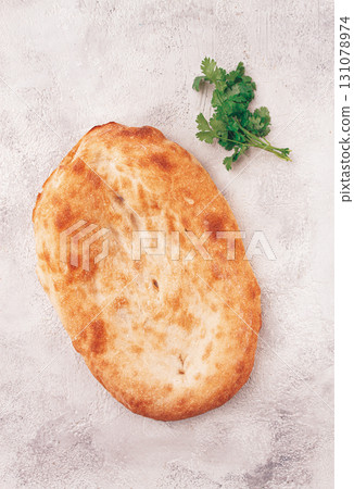 Georgian lavash bread, freshly baked, top view, on the table, no people, Georgian lavash bread, freshly baked, top view, on the table, no people, 131078974