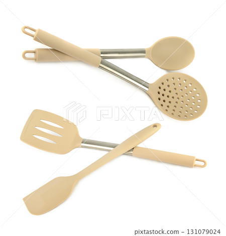 Kitchen Spatulas and Spoons on a White Background 131079024