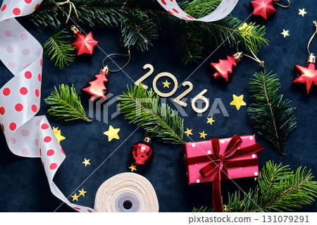 New Year 2026 background. Number of the coming year in Christmas decoration. 131079291