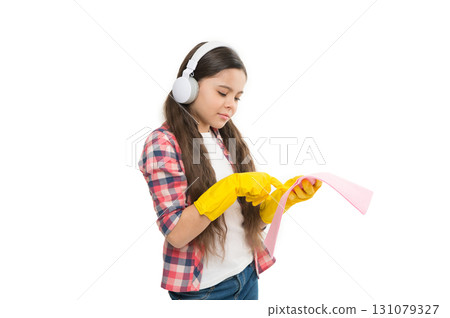 cleaning accessory. Cleaning worries away. Cleaning supplies. small girl earphones in yellow gloves. happy cleaning sunday. listen music housekeeping. Make household more joyful. child having fun cleaning accessory. Cleaning worries away. Cleaning supplies. small girl earphones in yellow gloves. happy cleaning sunday. listen music housekeeping. Make household more joyful. child having fun 131079327
