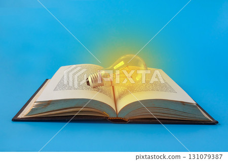 A light bulb on old books , Idea of learning, Education concept. 131079387