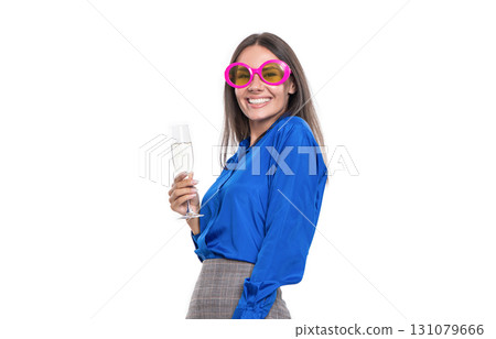 Businesswoman have fun in corporate party. Celebrate especial event. Corporate anniversary party. Business woman celebrating success cheering champagne. Party fun 131079666