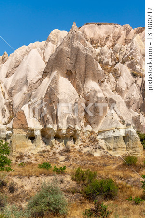 Volcanic rock formations landscape in Cappadocia, place of residence of ancient Christians Volcanic rock formations landscape in Cappadocia, place of residence of ancient Christians 131080212