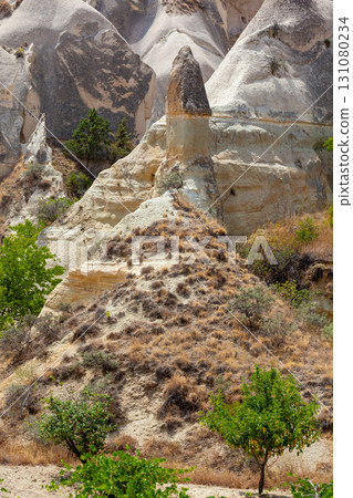 Volcanic rock formations landscape in Cappadocia, place of residence of ancient Christians Volcanic rock formations landscape in Cappadocia, place of residence of ancient Christians 131080234