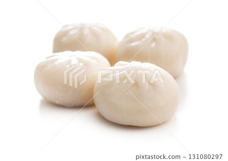 Xiao long bao. Chinese dumplings isolated on white background. Xiao long bao. Chinese dumplings isolated on white background. 131080297