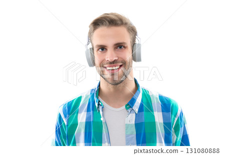 happy millennial man wear music headphones in studio. millennial man listening music 131080888