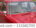 View on interior of retro car through windshield from the side of hood 131082705