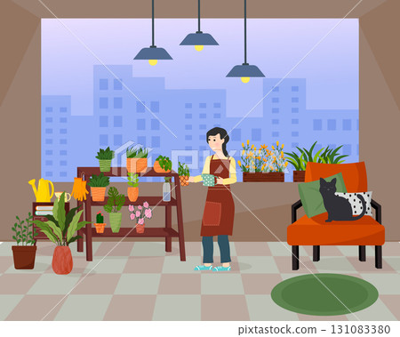 A young woman tends to houseplants in her balcony garden. A hobby for plant lovers. Home improvement and decor with greenery. 131083380